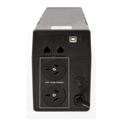 Back view of a power strip with multiple outlets and connectors on a white background